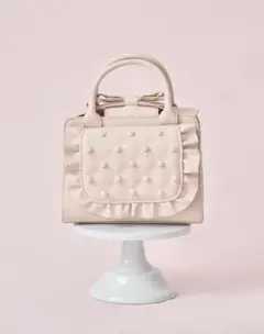 Mellfy pearl ribbon kiss-lock bag - メルカリ