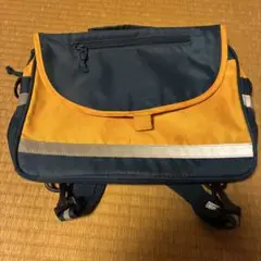 公文のナイロン製オレンジネイビーリュック