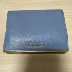 prada サフィアーノレザー 折り財布 水色 真贋証明カード等付 - メルカリ