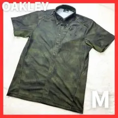 【オークリー】背中ビックロゴ 総柄 吸汗速乾 ストレッチゴルフ半袖ポロシャツ M