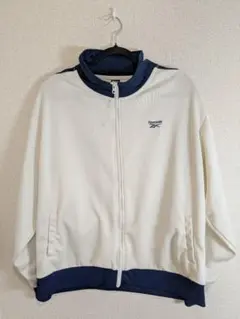 1109Reebok ジップアップジャケット ホワイト/ネイビー シミあり