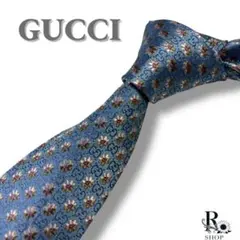 美品 グッチ ネクタイ シルク 水色 ビジネス向け 光沢　ボタニカル　総柄