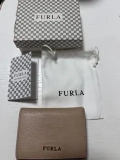 FURLA 三つ折り財布 ピンクベージュのサムネイル