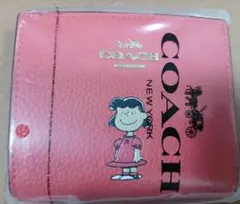 新品・未使用COACHコーチ ルーシースヌーピー 二つ折り財布 ピンク