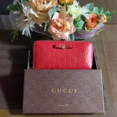 GUCCI シマリボンモチーフラウンドファスナー長財布