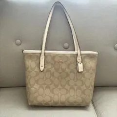 COACH ベージュ ロゴ柄 ハンドバッグ