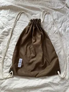 com9ure コムキュリ　ナップサック