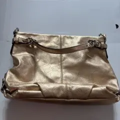 coach ゴールドレザー ハンドバッグ穴あき模様