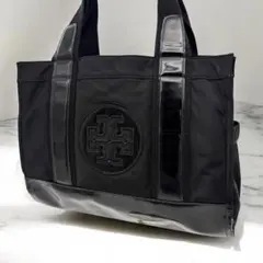 トリーバーチ エラ トートバッグ ブラック エナメル キャンバス Tロゴ