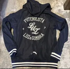 Luz e Sombra フード付きピステ Lサイズ ネイビー/イエロー