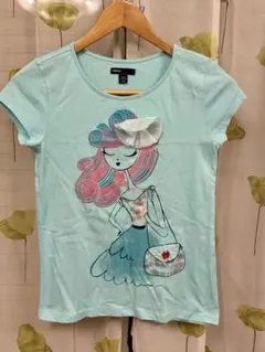✨新品未使用✨GAP ガールズTシャツ 水色 ドールイラスト 150店頭即完売品