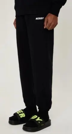 NERDY ノルディ ベーシックロゴ スウェット パンツ 黒 韓国のサムネイル