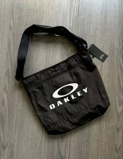 新品 OAKLEY オークリー ショルダーバッグ ゴルフポーチ たすき掛け可能