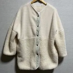 クリーム色 フリースジャケット ボタン付き