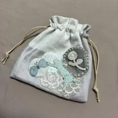 ミナペルホネン　ハンドメイド　 run run run 重ねパッチワーク　巾着のサムネイル