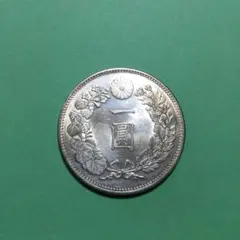 ファンタジー品】 新1円銀貨 明治7年 貿易銀 - メルカリ