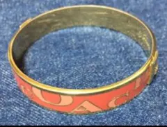 コーチ　COACH バングル　ブレスレット　ピンク　ロゴ　コーラルピンク