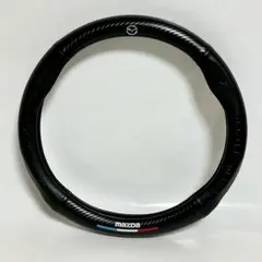 極美品・マツダ専用デザイン！上質なカーボン調×レザーのハンドルカバーのサムネイル