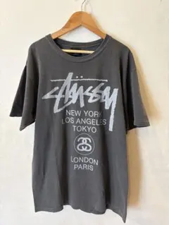 Stussy World Tour Tシャツ グレー Mサイズのサムネイル