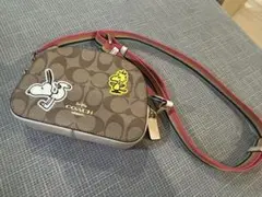 Coach × Peanuts コラボシグネチャー カメラバッグ スヌーピー