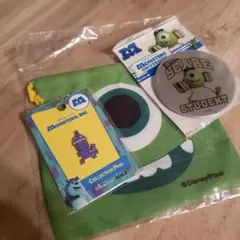 モンスターズ・インク 缶バッジと巾着袋とピンバッジのセット