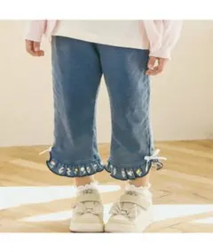 BEBE パンツ SLAPSLIP 裾フリルお花プリント7分丈パンツ