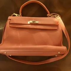 オレンジ レザー ハンドバッグ ゴールド金具 牛革型押し