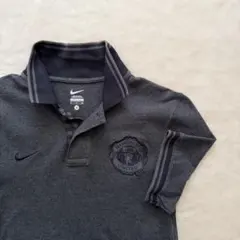 Nike Manchester United メンズ半袖ポロシャツ ダークグレー