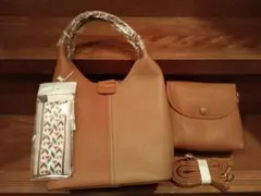 モンテロッソ オレンジ系レザー風ハンドバッグ バッグインバッグ付き