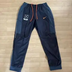 Nike NFTB ピステパンツ 黒/グレー/オレンジ