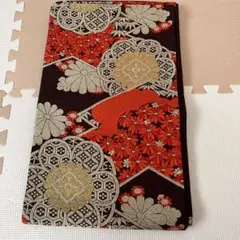 華やかな赤と金の袋帯　未仕立て　松皮菱に菊文