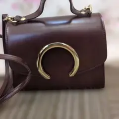 anuans モチーフ付きミニハンドルバッグ ボルドー - メルカリ
