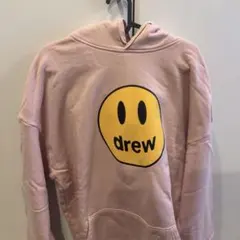 drew スマイリーフェイス パーカー ピンク - メルカリ