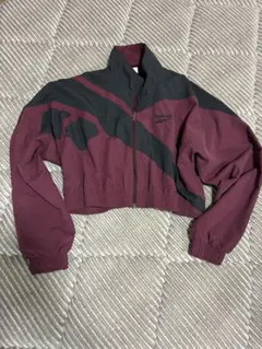 Reebokクロップド トラックジャケット ナイロンジャケット ボルドー黒