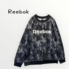 【Reebok 】タイダイ トレーナースウェット 総柄　英字ロゴ