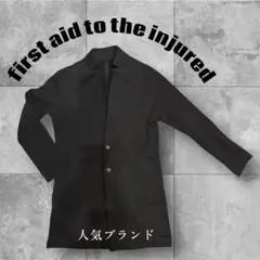 first aid to the injured ブラック コート