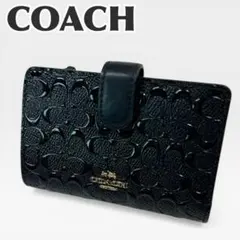 COACH デボスド シグネチャーエナメル凹凸レザーコーナー ジップ ラメ入り