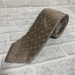LES MUES  スクエア&小花柄ネクタイ　ブラウン系　光沢