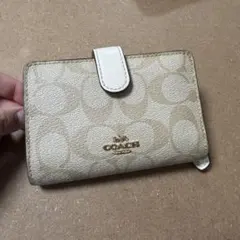 COACH 二つ折り財布 シグネチャー ベージュのサムネイル