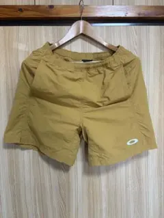 OAKLEY ショートパンツ マスタード JPN Sのサムネイル
