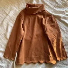 オレンジ リブ編み フリル付き長袖カットソー