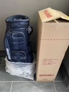 新作！未使用！BRIEFING キャディバッグ ベージュ Munsingwear マンシング 合皮素材フラッグ飛び柄キャディバッグ