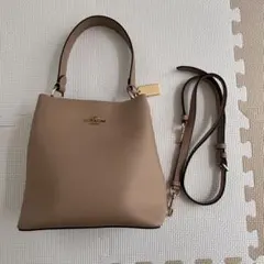 COACH ベージュ モリーバケットバッグ ショルダーストラップ付き