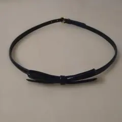 【PRADA】リボンデザイン 黒 表面エナメル、皮革ベルト