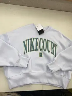 新品・未使用 NIKE COURT ナイキ クロップドスウェット ライトブルーのサムネイル