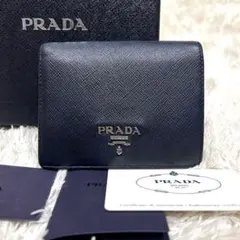 美品✨プラダ 二つ折り財布 サフィアーノレザー メタルロゴ 札入れ ネイビー
