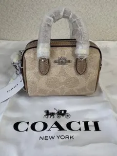 COACH コーチミニ ローアン バッグ チャーム・シグネチャー キャンバす