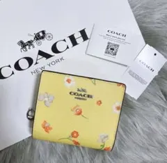 COACH コーチ　折り財布　イエロー　黄色　花柄　フラワー　二つ折り財布