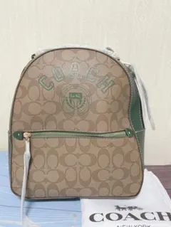 〔新品未使用〕COACH ブラウン ロゴバックパックのサムネイル