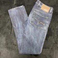 DIESEL スタッズ付きダークデニムジーンズ